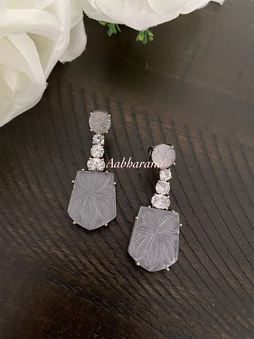 Carved stone earrings