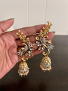 Kundan peacock jumka earrings